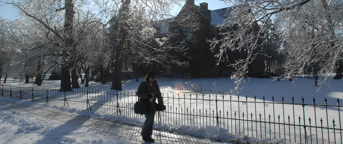 Winter on Campus with student walking