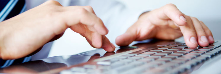 man using a computer keyboard