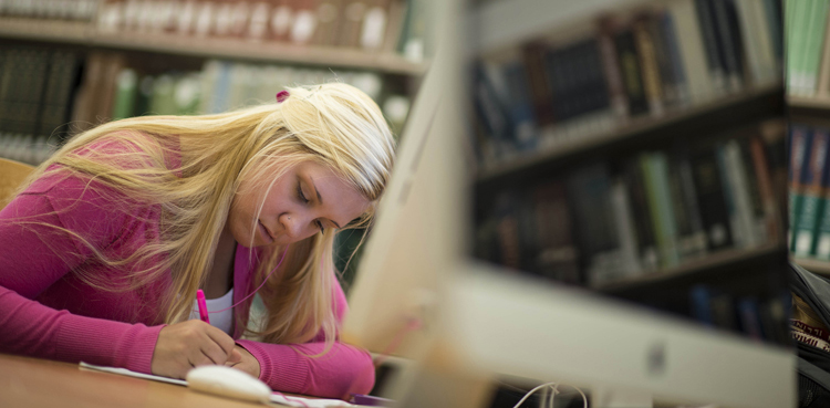 Girl studying/writing